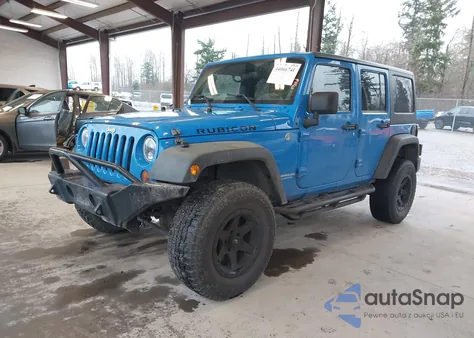 2011 Jeep Wrangler Unlimited Rubicon z USA, uszkodzony, nr VIN 1J4BA6H10BL600311